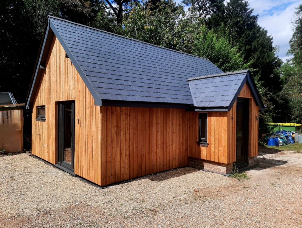 Modern timber-clad new build by Truebuild Contractors in East Sussex
